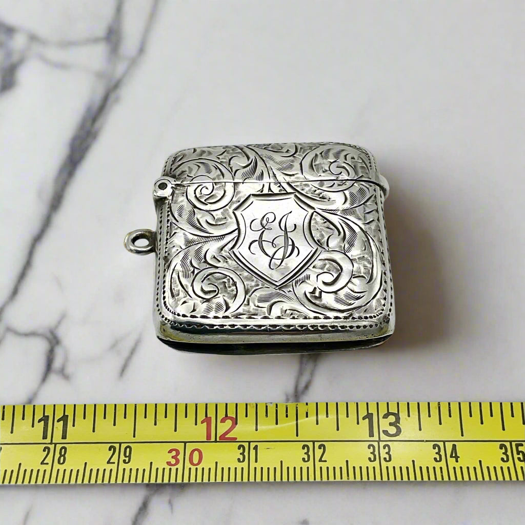 Silver Vesta next to tape measure on a marble worktop