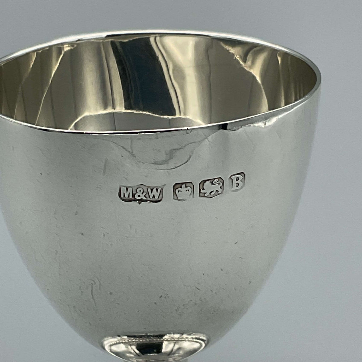 Sterling silver egg cup from 1944 by Beeches Vintage, ideal for christening or baby gift, with decorative engraved design.