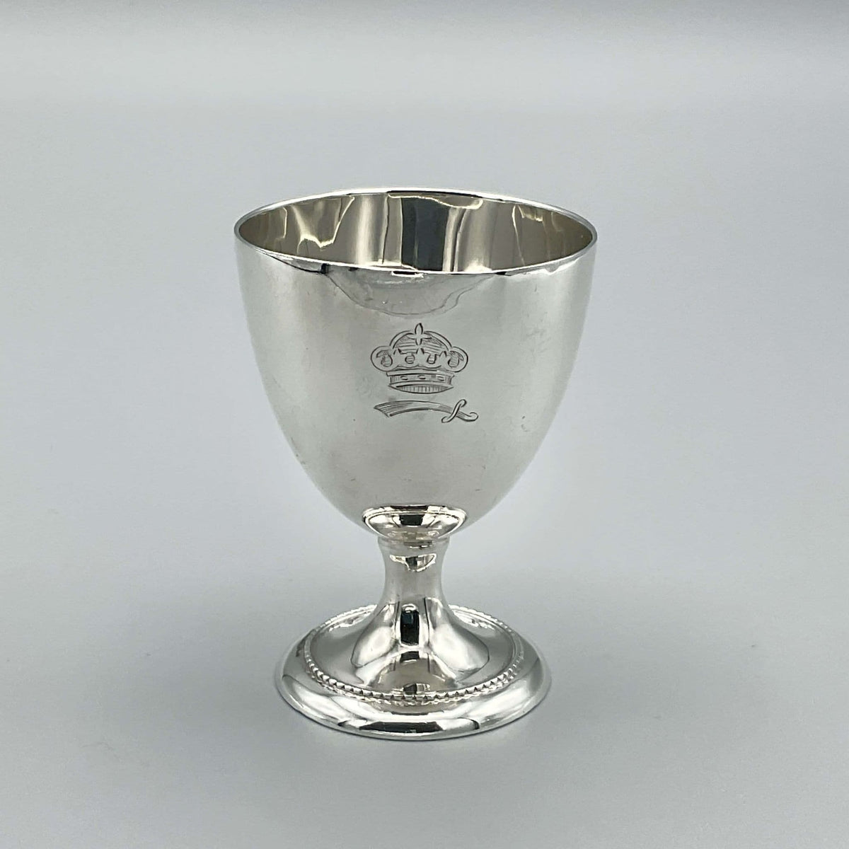 Sterling silver egg cup from 1944 by Beeches Vintage, ideal for christening or baby gift, with detailed embossed design.