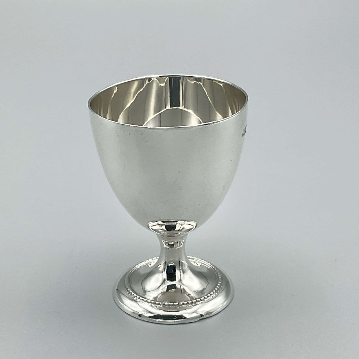 Sterling silver egg cup from 1944 by Beeches Vintage, ideal for christening or baby gift, with intricate vintage design.