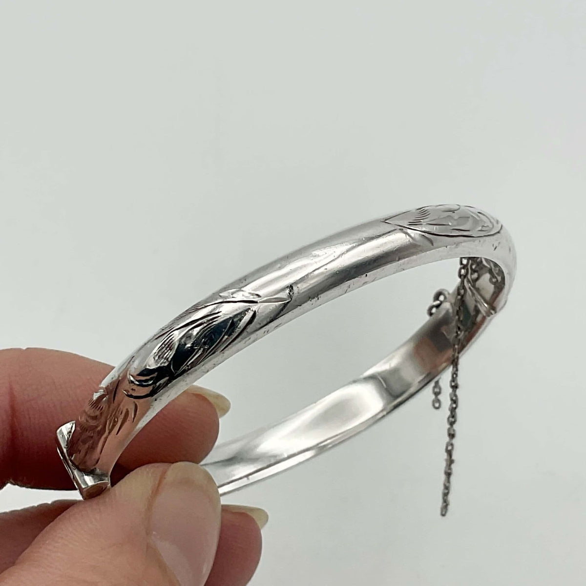 Sterling silver baby or child's bracelet from Beeches Vintage, featuring a delicate design with a secure clasp.