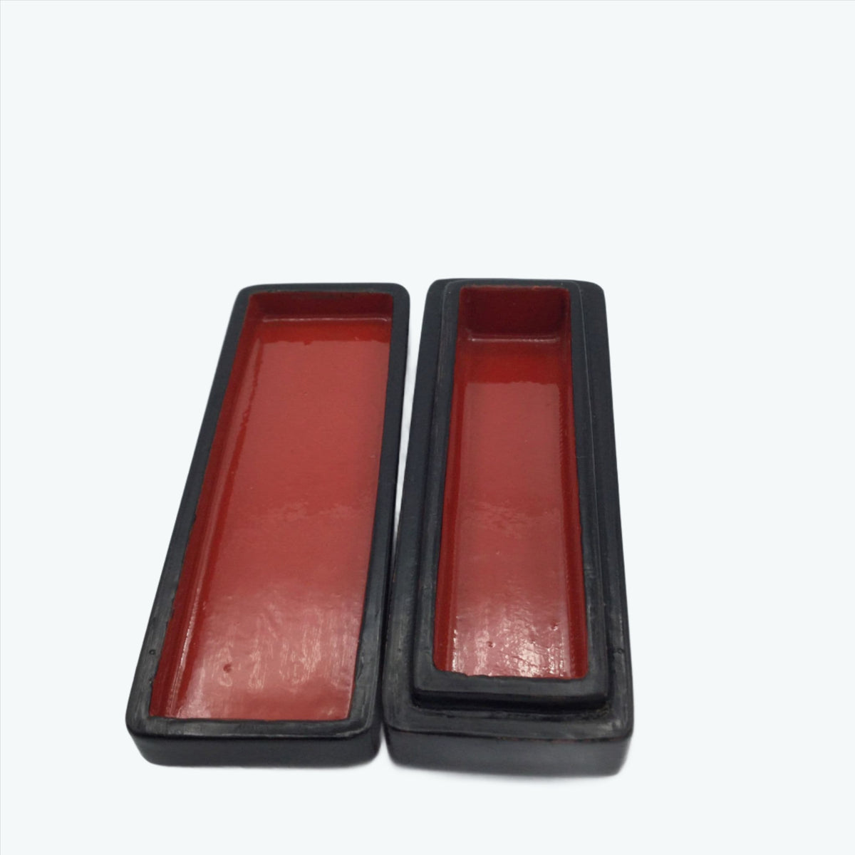 Inside of the box showing a red enamel colour.