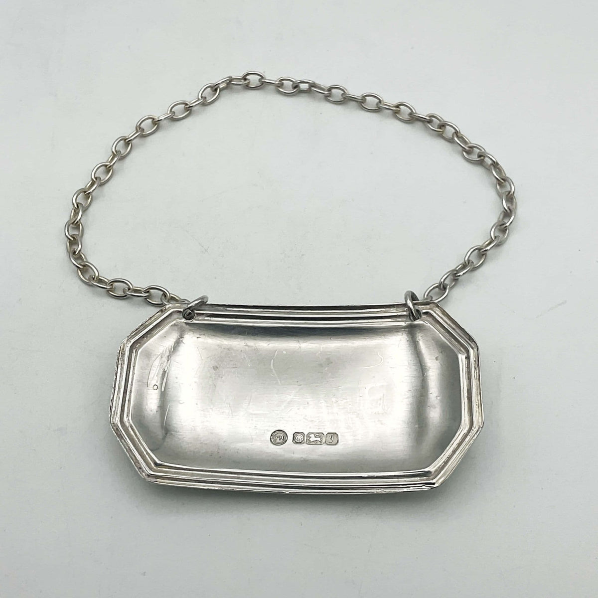 Vintage 1983 Brandy Sterling Silver Decanter Label by Beeches Vintage, featuring intricate engraved details and classic design.