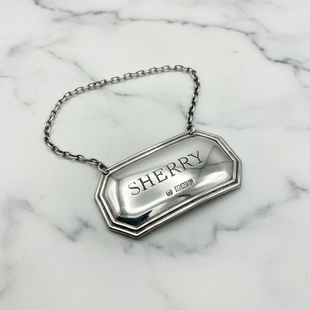 Sherry decanter label on a marble worktop