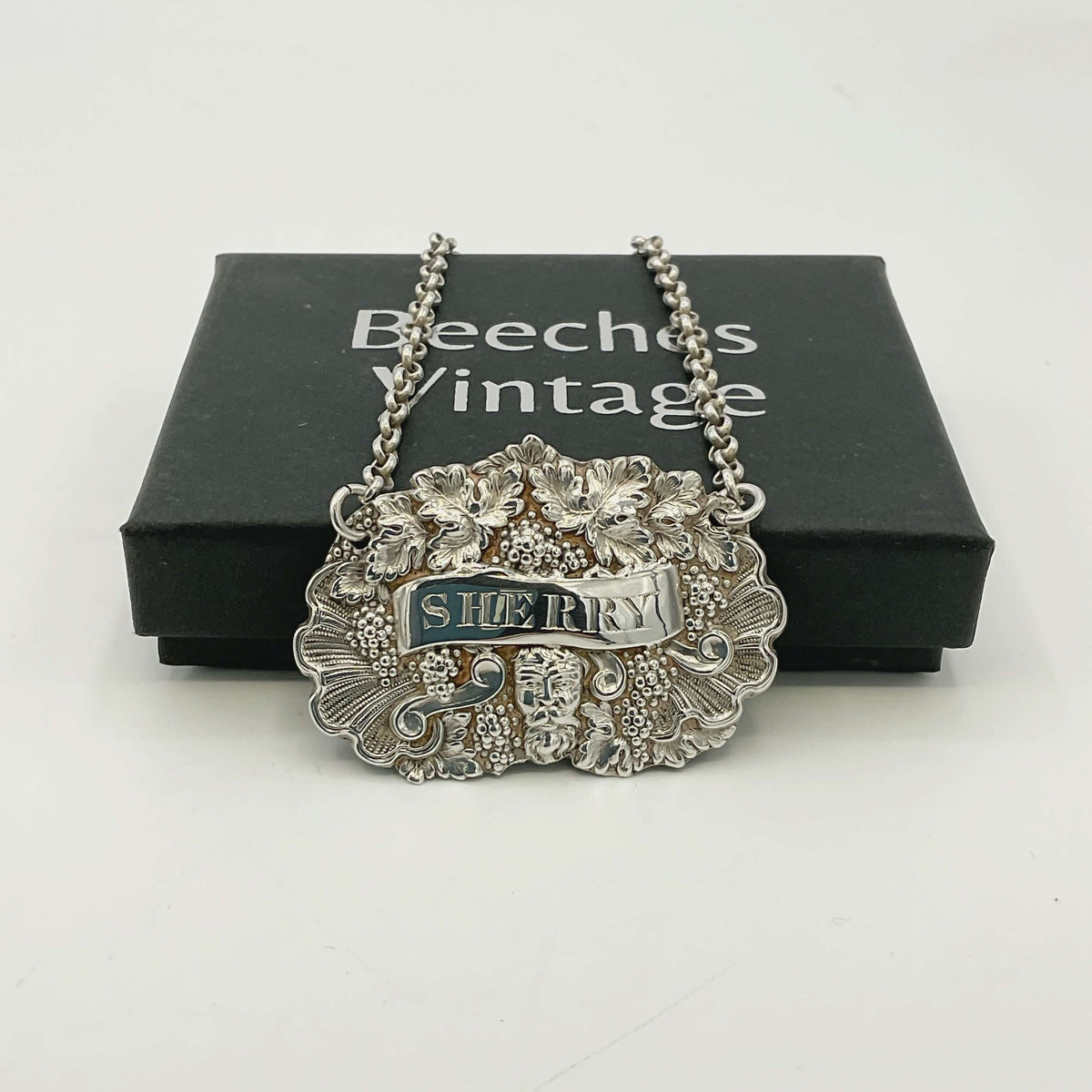 Silver 'Sherry' decanter label on a white background with a 'Beeches Vintage' box.