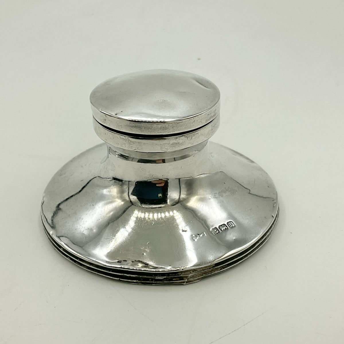 Antique small sterling silver inkwell with engraved details, vintage style, by Beeches Vintage, displayed on a wooden surface.