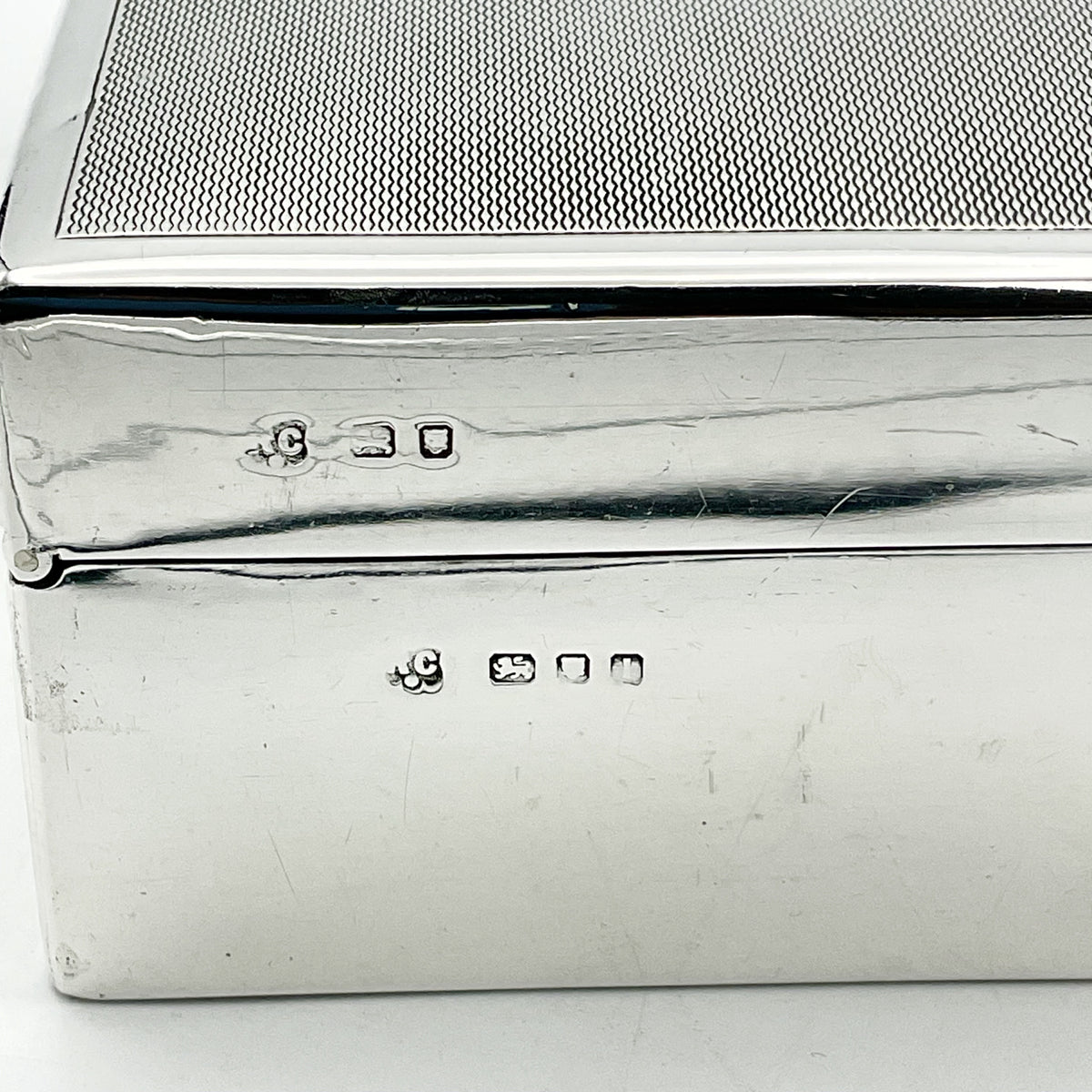 Hallmarks for London on the side of the Sterling Silver cigarette box