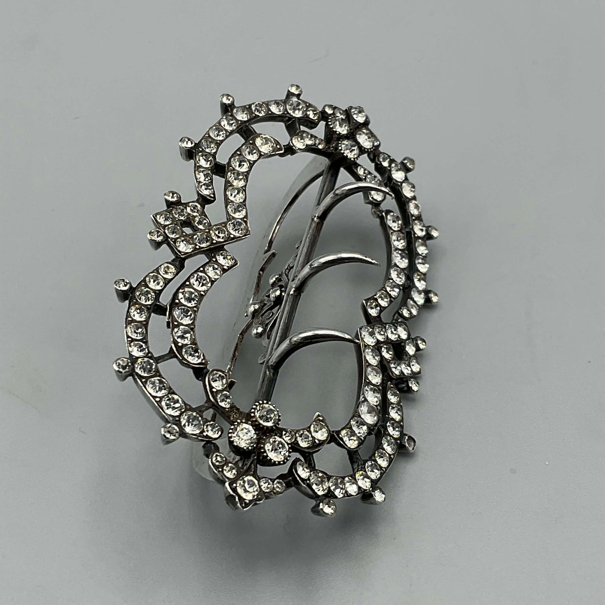 Antique cubic zirconia hair clip from Beeches Vintage, vintage-inspired hair accessory with sparkling stones and intricate design.