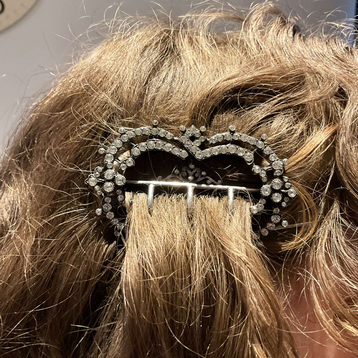 Antique cubic zirconia hair clip from Beeches Vintage, elegant hair accessory with sparkling stones and intricate design.