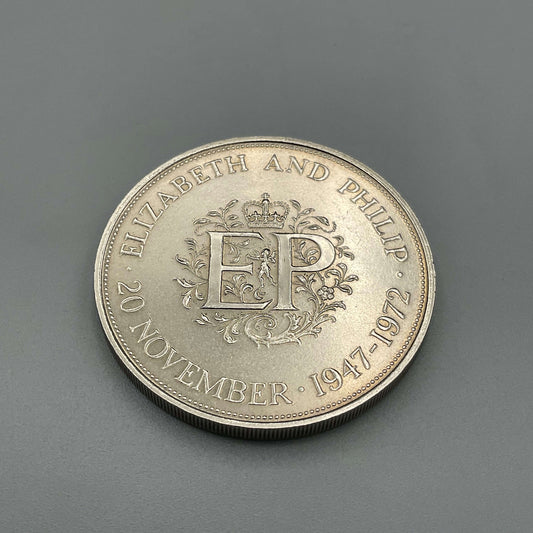 Beeches Vintage Queens 1972 Silver Wedding Anniversary Crown Coin, close-up of detailed silver commemorative coin.