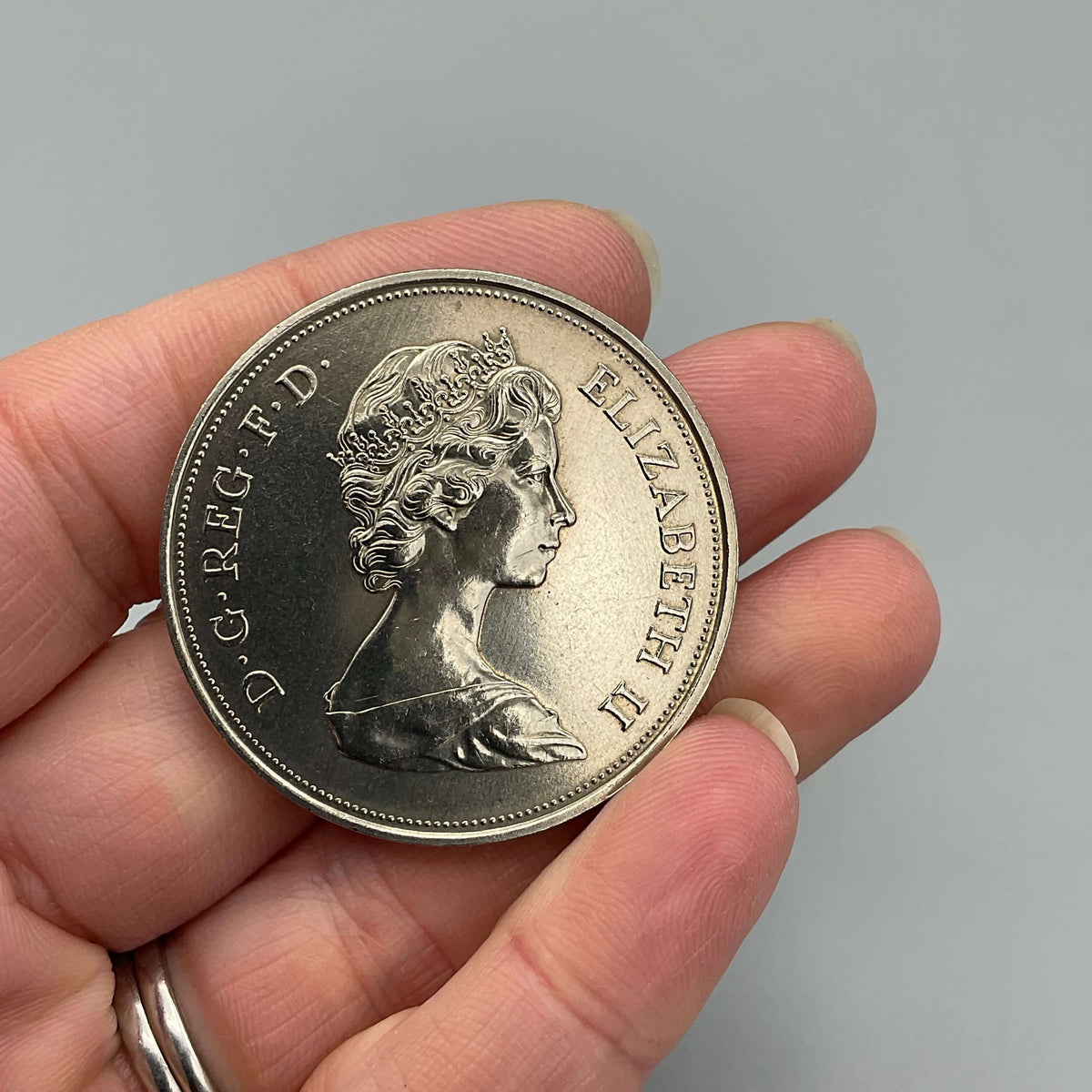 Silver Queen's 1972 Wedding Anniversary coin by Beeches Vintage, featuring intricate design and vintage silver craftsmanship.