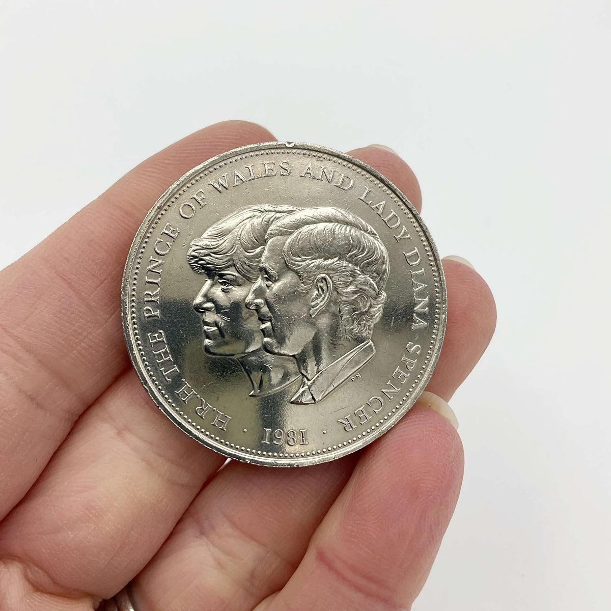 Charles and Diana 1981 royal wedding coin by Beeches Vintage, featuring detailed imagery of the historic coin.