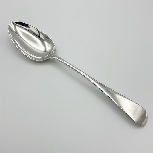 Antique Georgian 1788 silver serving spoon with intricate handle, crafted by Beeches Vintage, classic vintage tableware piece.