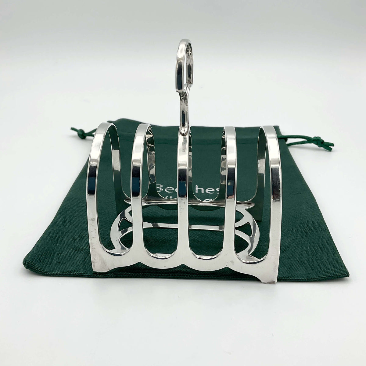 Antique 1912 Sterling Silver Toast Rack with intricate detailing, crafted by Beeches Vintage, showcasing vintage elegance and craftsmanship.
