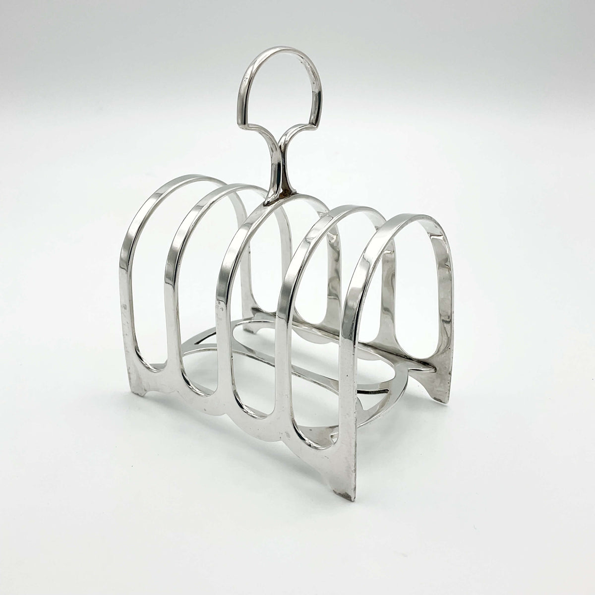 Antique 1912 Sterling Silver Toast Rack by Beeches Vintage, featuring intricate design and multiple slots for toast.