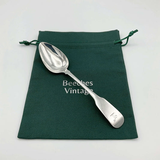 Antique 1813 Sterling Silver Dessert Spoon by Beeches Vintage, featuring intricate engraved details and a polished finish.