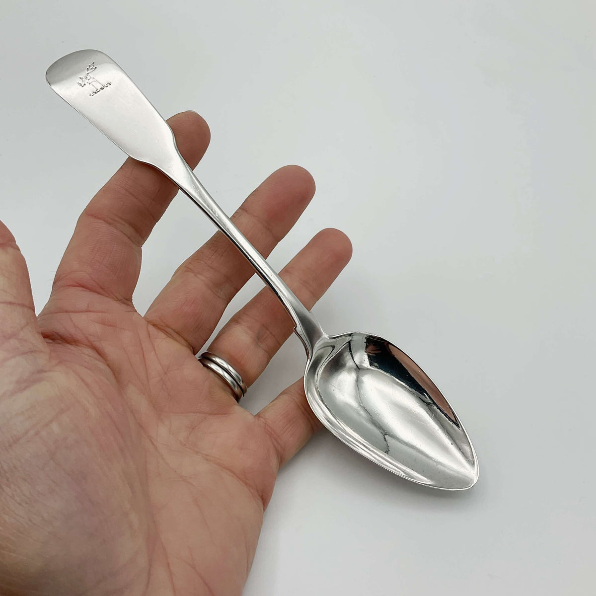 Antique 1813 Sterling Silver Dessert Spoon by Beeches Vintage, detailed close-up of ornate handle and polished silver surface