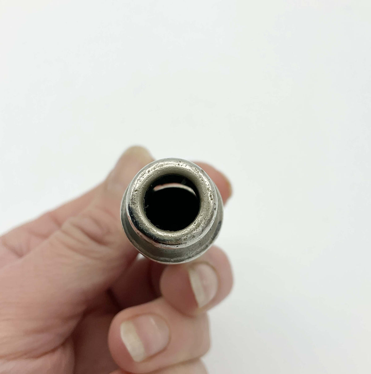 Vintage Beeches Antique Police Whistle as a stylish accessories piece, showcasing its detailed metal design and classic finish.