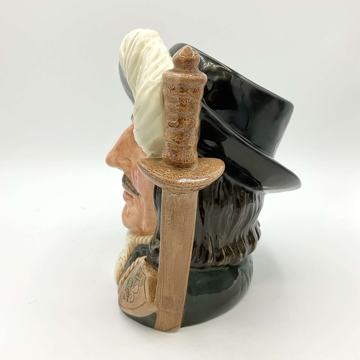 Side view of Large Royal Doulton Athos Toby Jug on a plain background