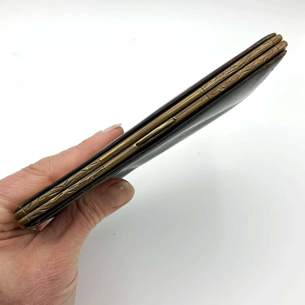 Vintage 1940s leather card case by Beeches Vintage, featuring a classic design with multiple card slots and aged leather finish.