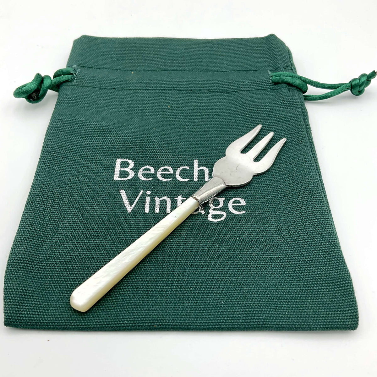 Small silver plated olive pickle fork with a mother of pearl handle, vintage Beeches fork for serving olives or pickles.