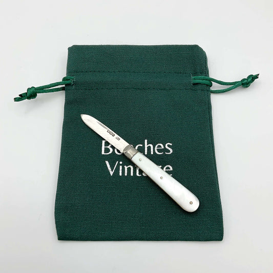 Vintage 1928 Beeches Vintage sterling silver fruit knife with ornate handle and sharp blade, classic antique cutlery piece.