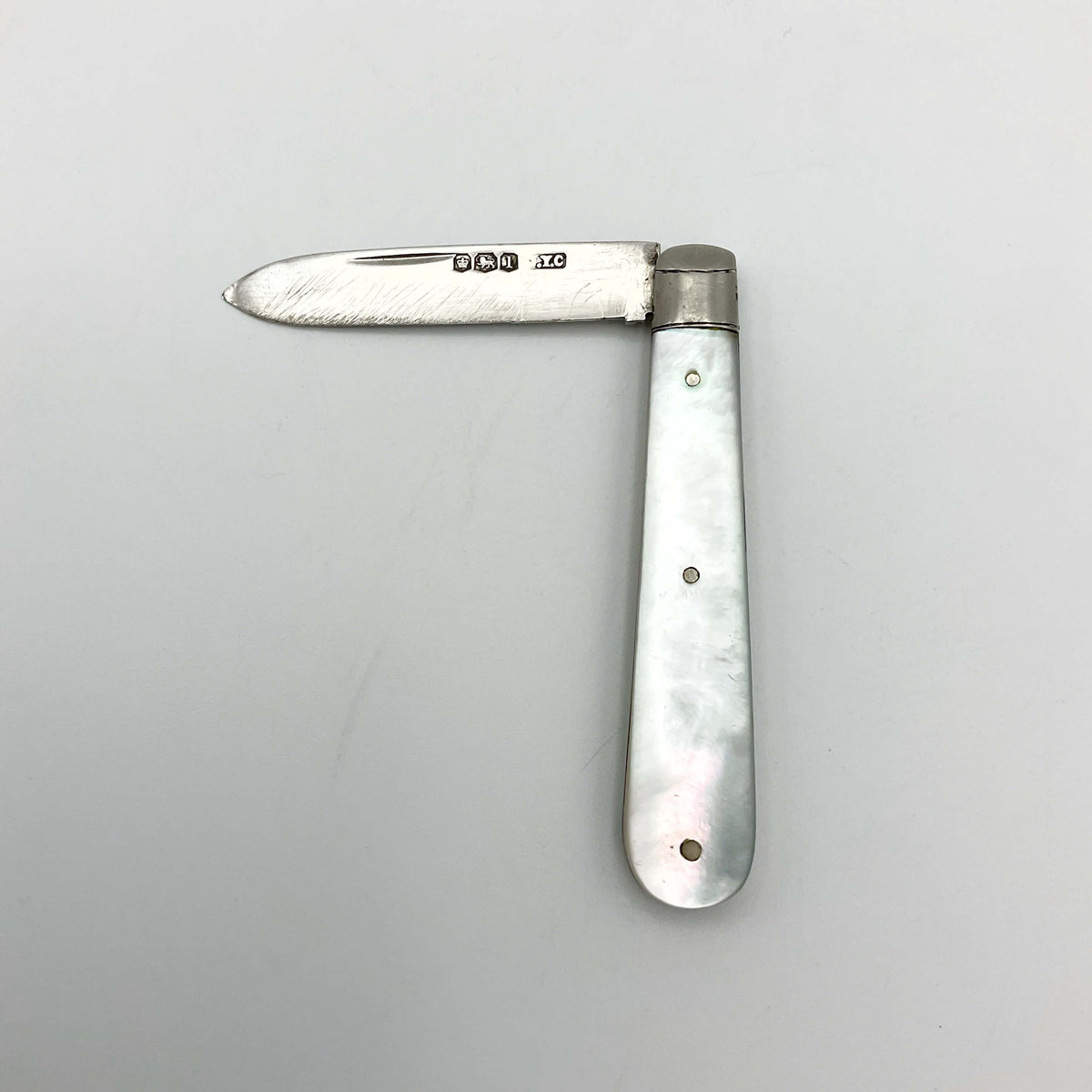 Vintage 1928 Beeches Vintage sterling silver fruit knife with ornate handle and blade, shown on a white background.