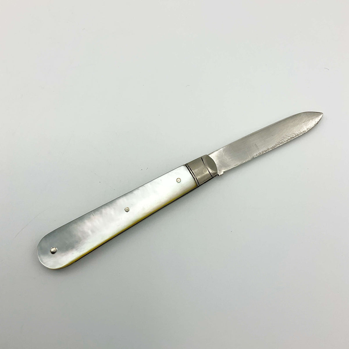 Vintage 1928 Beeches Vintage sterling silver fruit knife with ornate handle and blade, classic antique tableware piece.