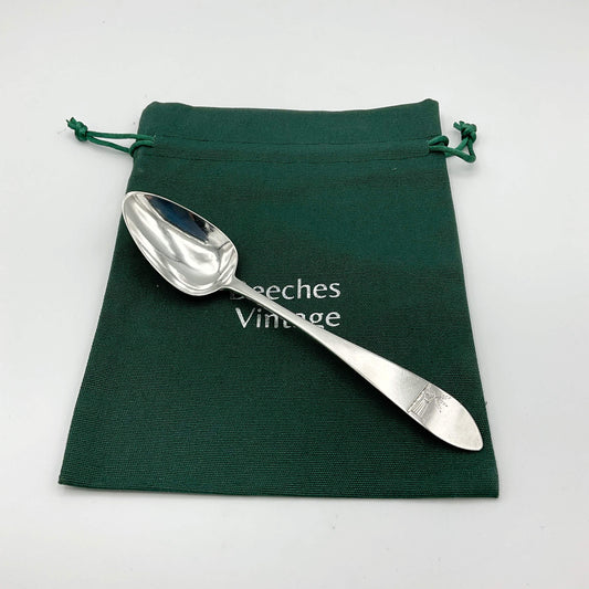 Antique Beeches Vintage solid silver dessert spoon from 1788 with ornate handle and classic design, reflecting vintage craftsmanship.