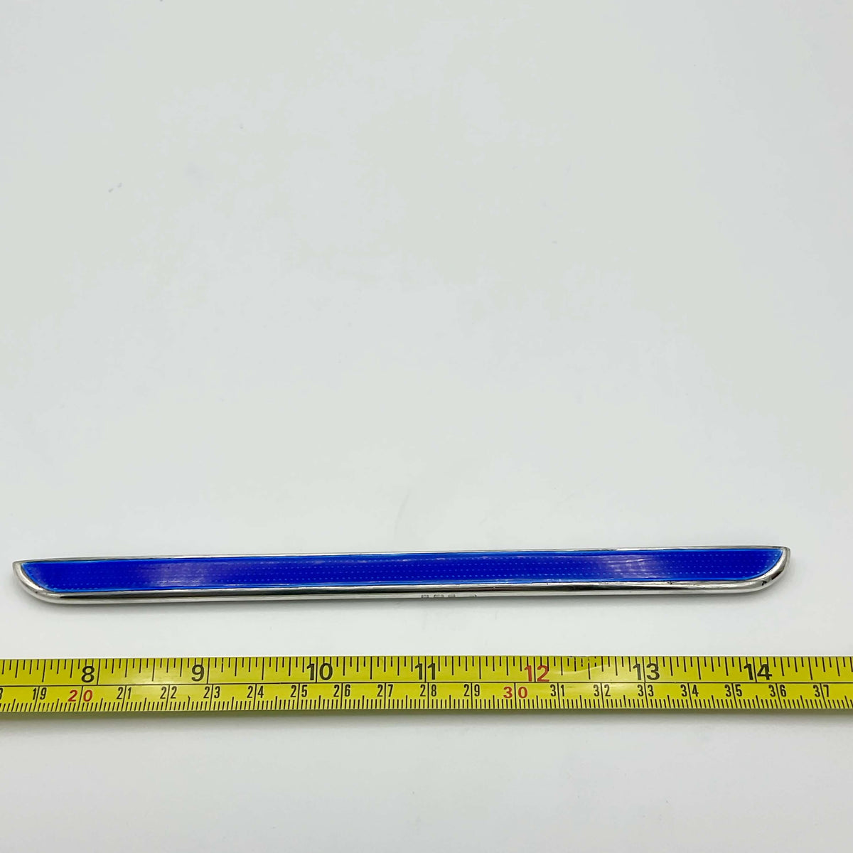 Vintage 1920s sterling silver and enamel comb-back accessory by Beeches Vintage, featuring intricate enamel detailing.