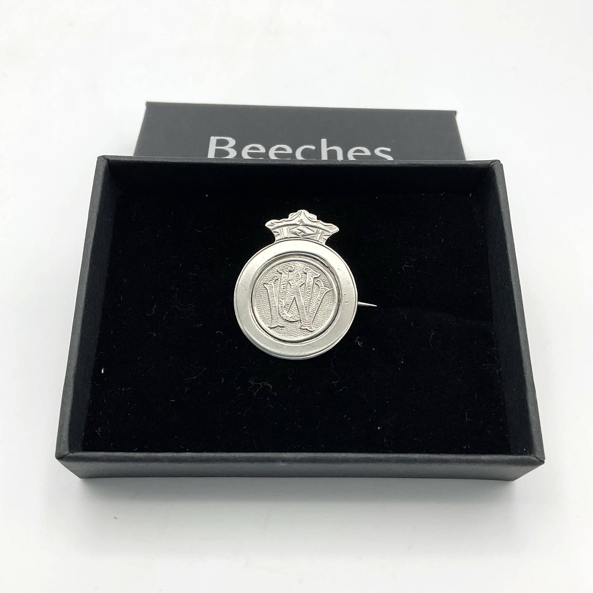Vintage 1920s sterling silver union badge with detailed engraving, featuring Beeches Vintage branding.