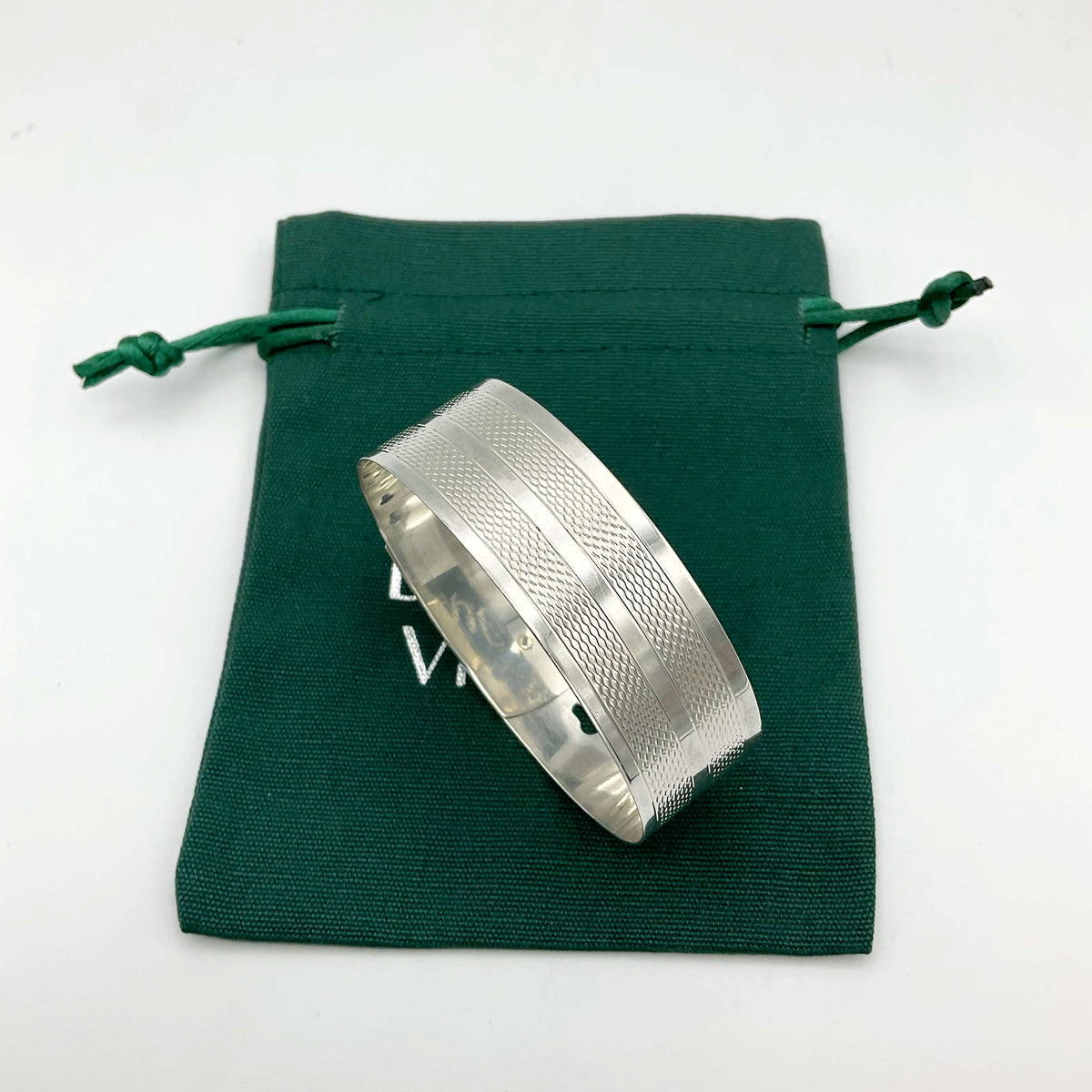 Silver adjustable bangle bracelet from Beeches Vintage with a sleek, minimalist design and smooth finish.