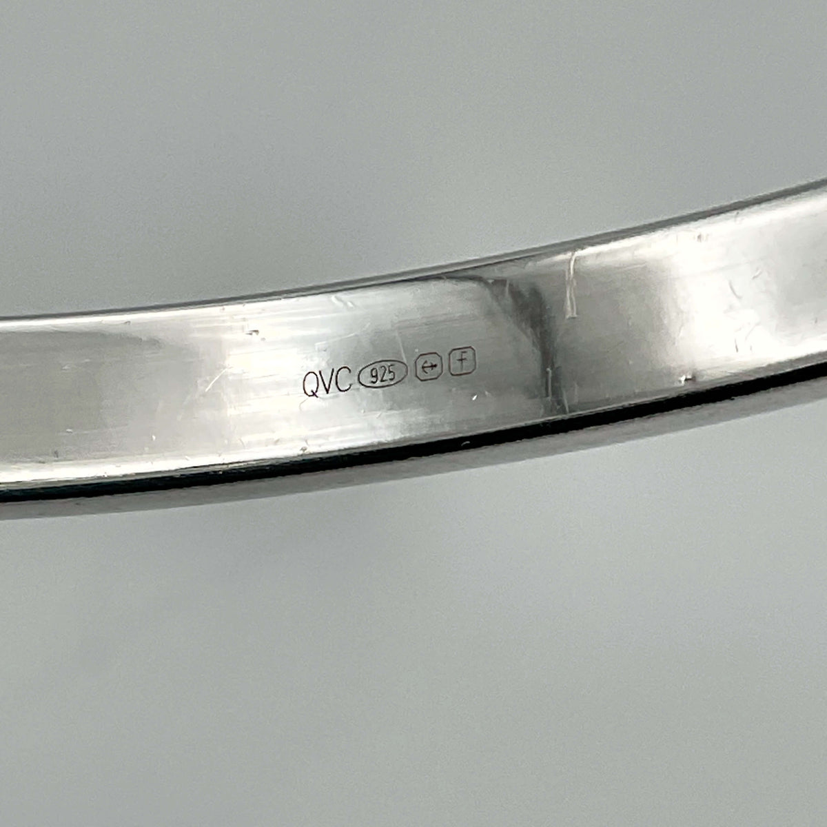 Sterling silver hinged bangle bracelet with cubic zirconia accents, designed by Beeches Vintage.