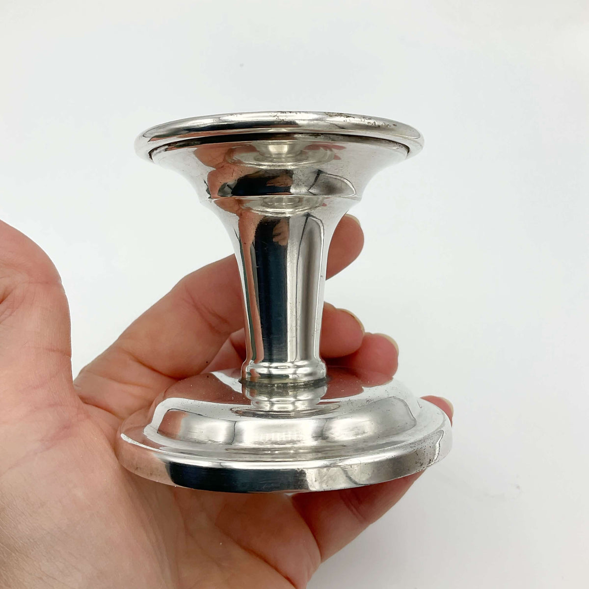 Vintage 1960s silver-plated candlestick holder with ornate design, classic style, and polished finish from Beeches Vintage.