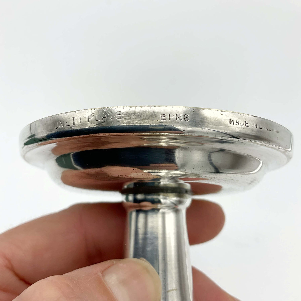 Vintage 1960s silver plated candlestick holder by Beeches Vintage, with intricate detailing and classic design for antique decor.