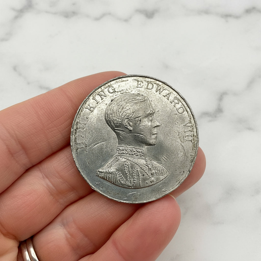 Coin in hand with a marble background 