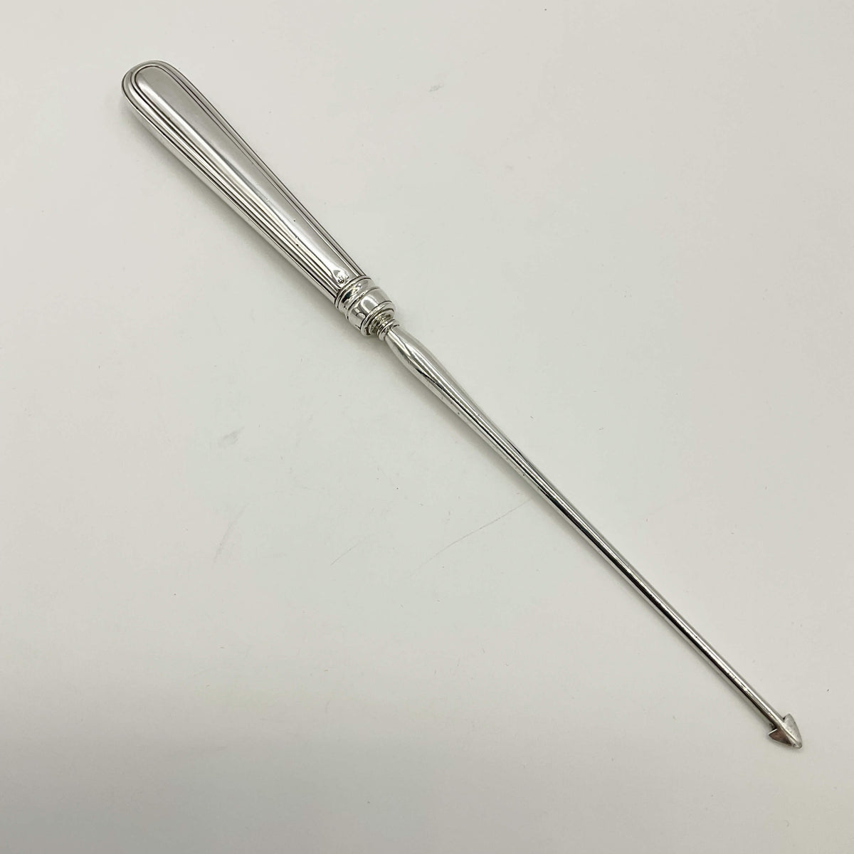 Antique 1871 Victorian Sterling Silver Arrowhead Tool accessory with intricate detailing, crafted by Beeches Vintage.