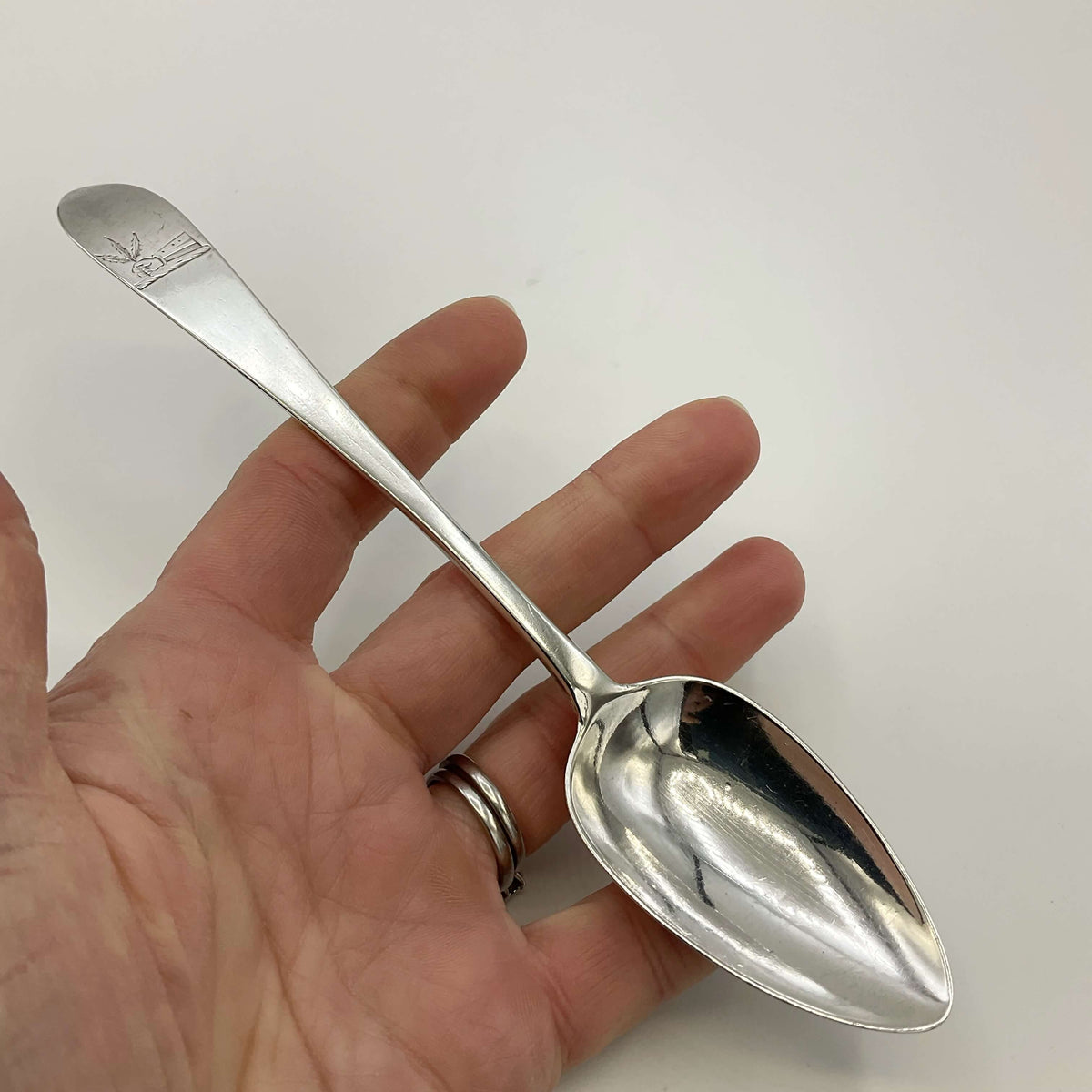 Vintage 1700s sterling silver dessert spoon by Beeches Vintage, featuring intricate detailing and a polished finish.