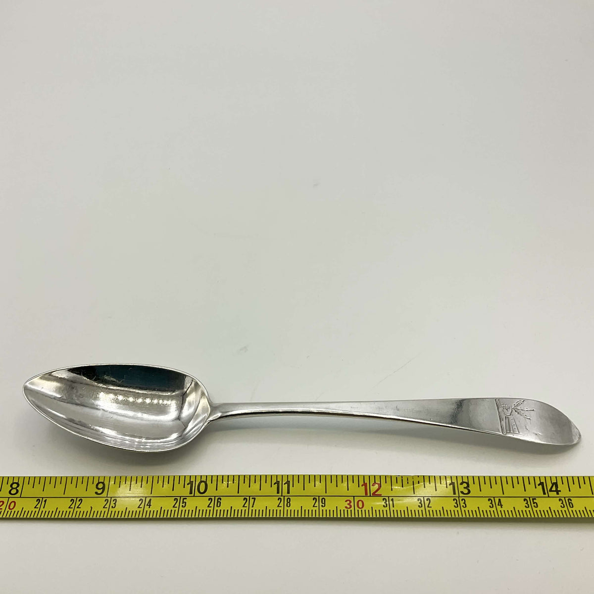 Vintage 1700s sterling silver dessert spoon by Beeches Vintage, featuring ornate handle and polished bowl.