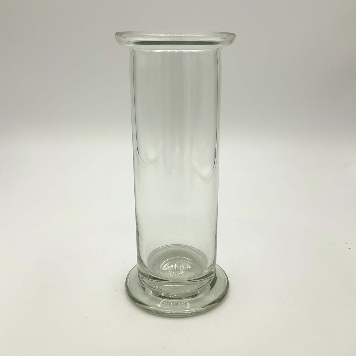 Clear glass vase with vintage cylinder design by Beeches Vintage, showcasing its elegant, transparent glass construction.