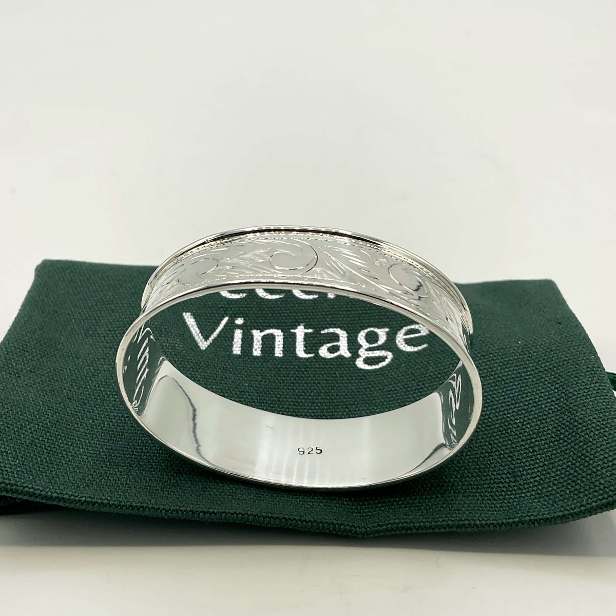 Solid sterling silver napkin ring from Beeches Vintage, featuring a smooth, polished finish for elegant table settings.