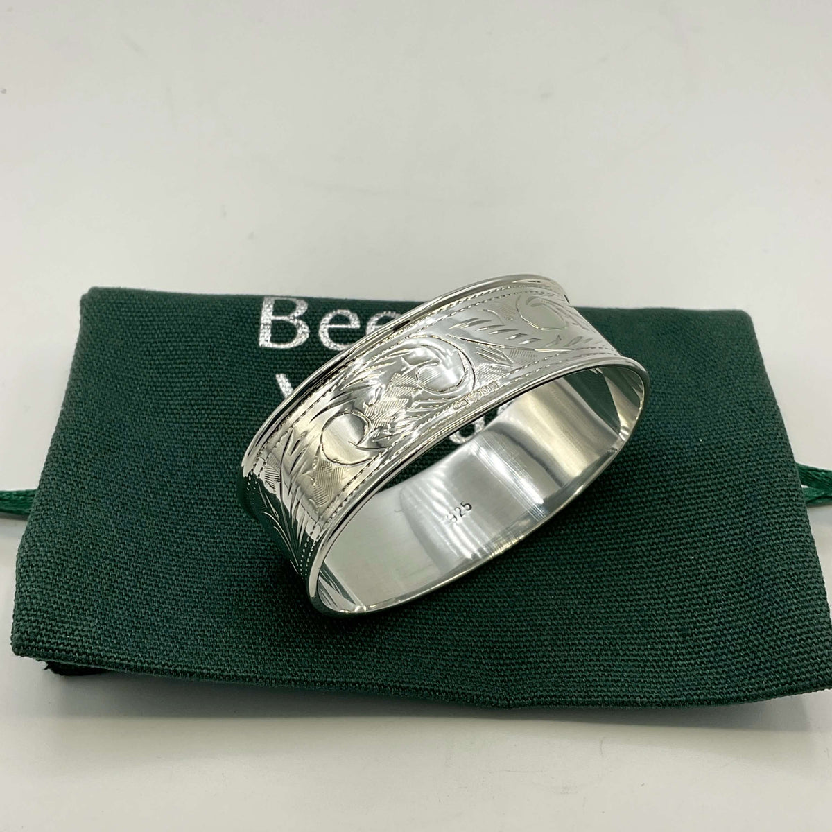 Solid sterling silver napkin ring by Beeches Vintage, showcasing a polished, classic design for elegant table settings.