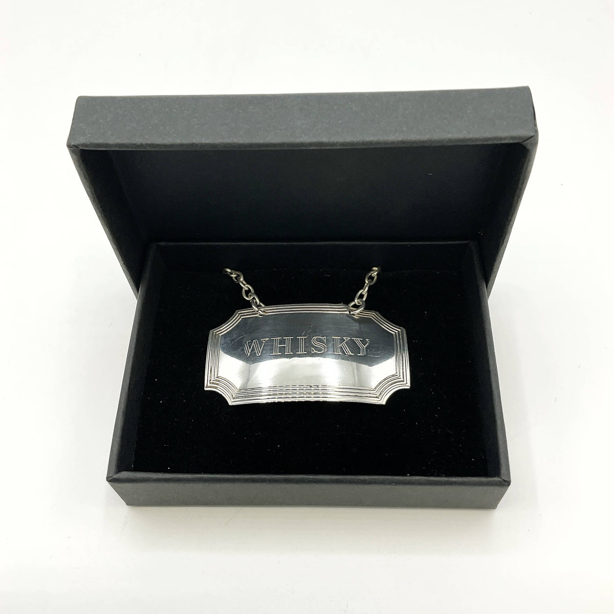 Silver Whisky decanter label inside a black Beeches Vintage presentation box on a white background 