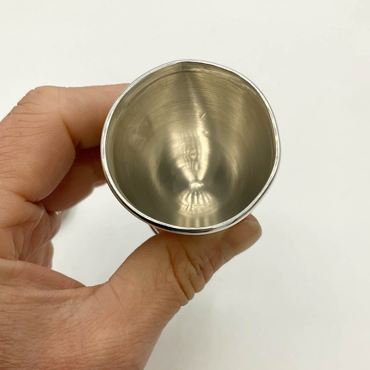 Sterling Silver Egg Cup held in fingers