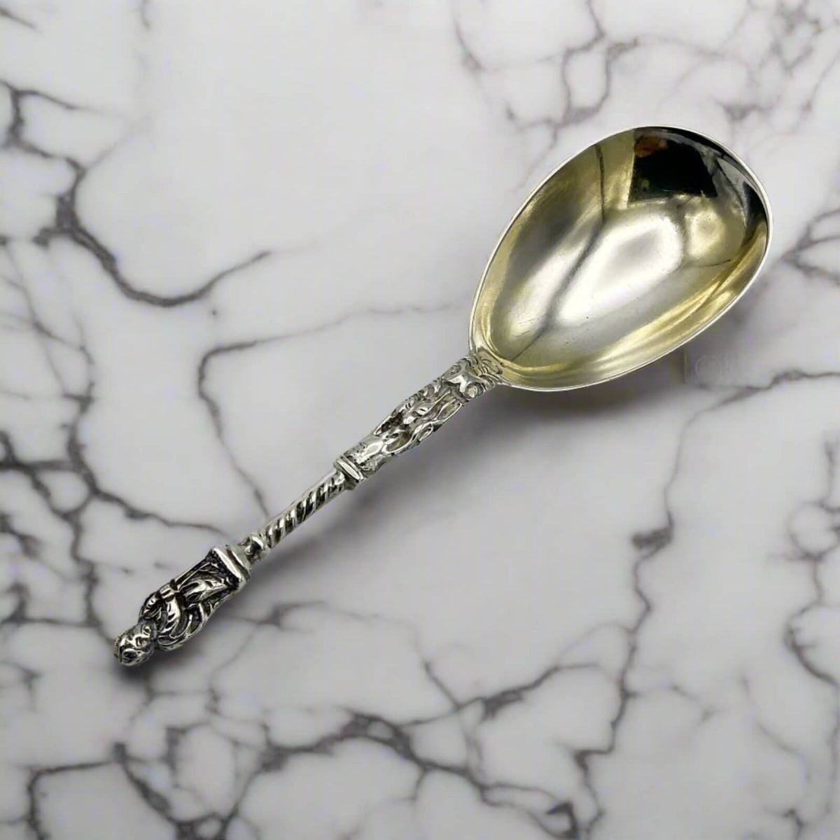 Decorative spoon on a marble surface