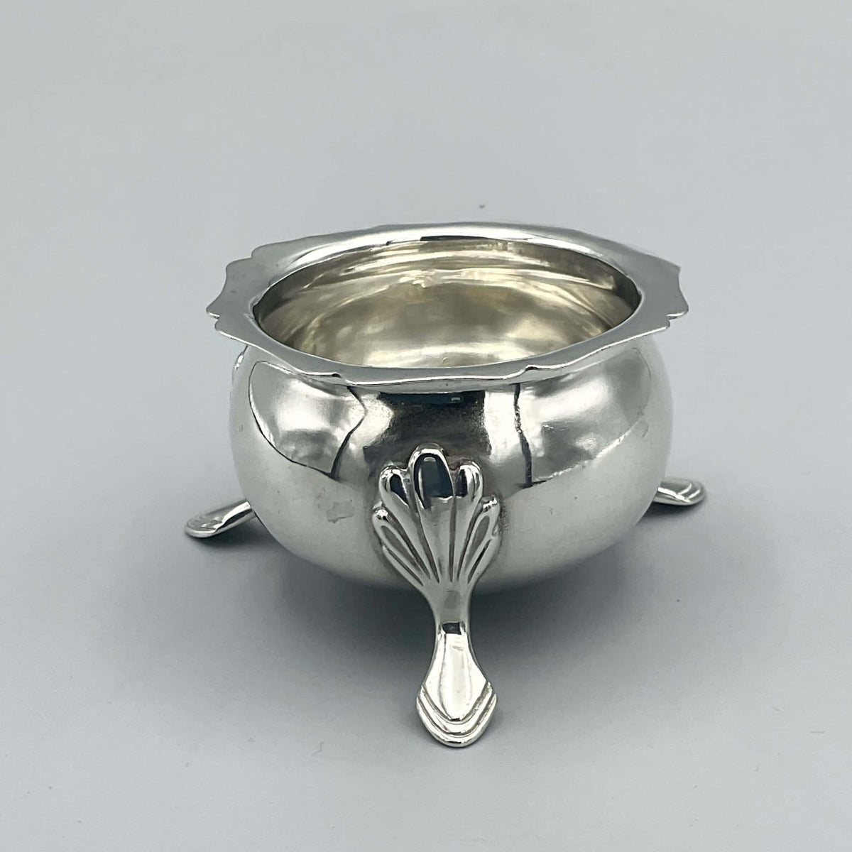Antique 1908 Sterling Silver Salt Bowl and Rings Dish by Beeches Vintage, featuring intricate silver craftsmanship.