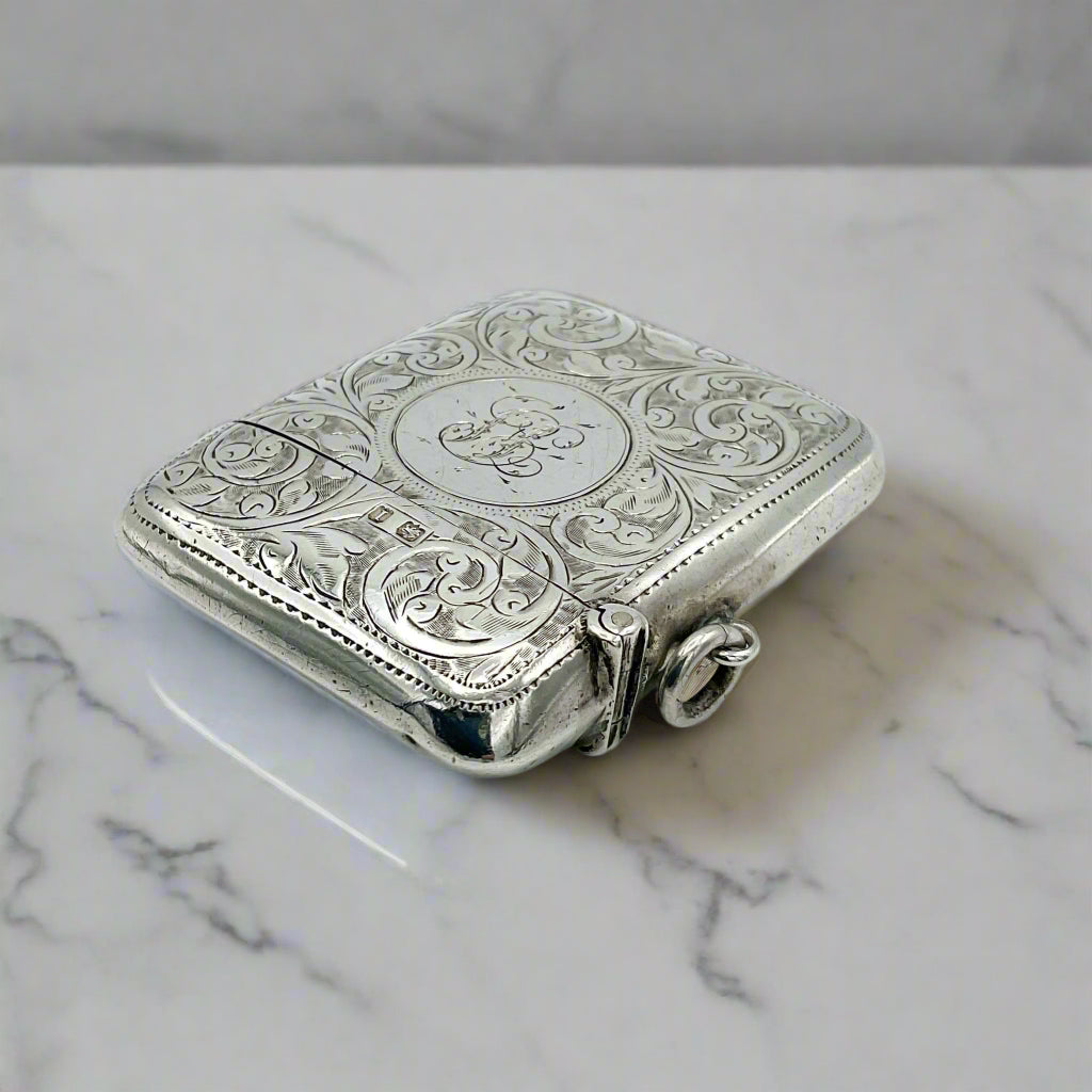 Corner view of silver Vesta case on marble worktop
