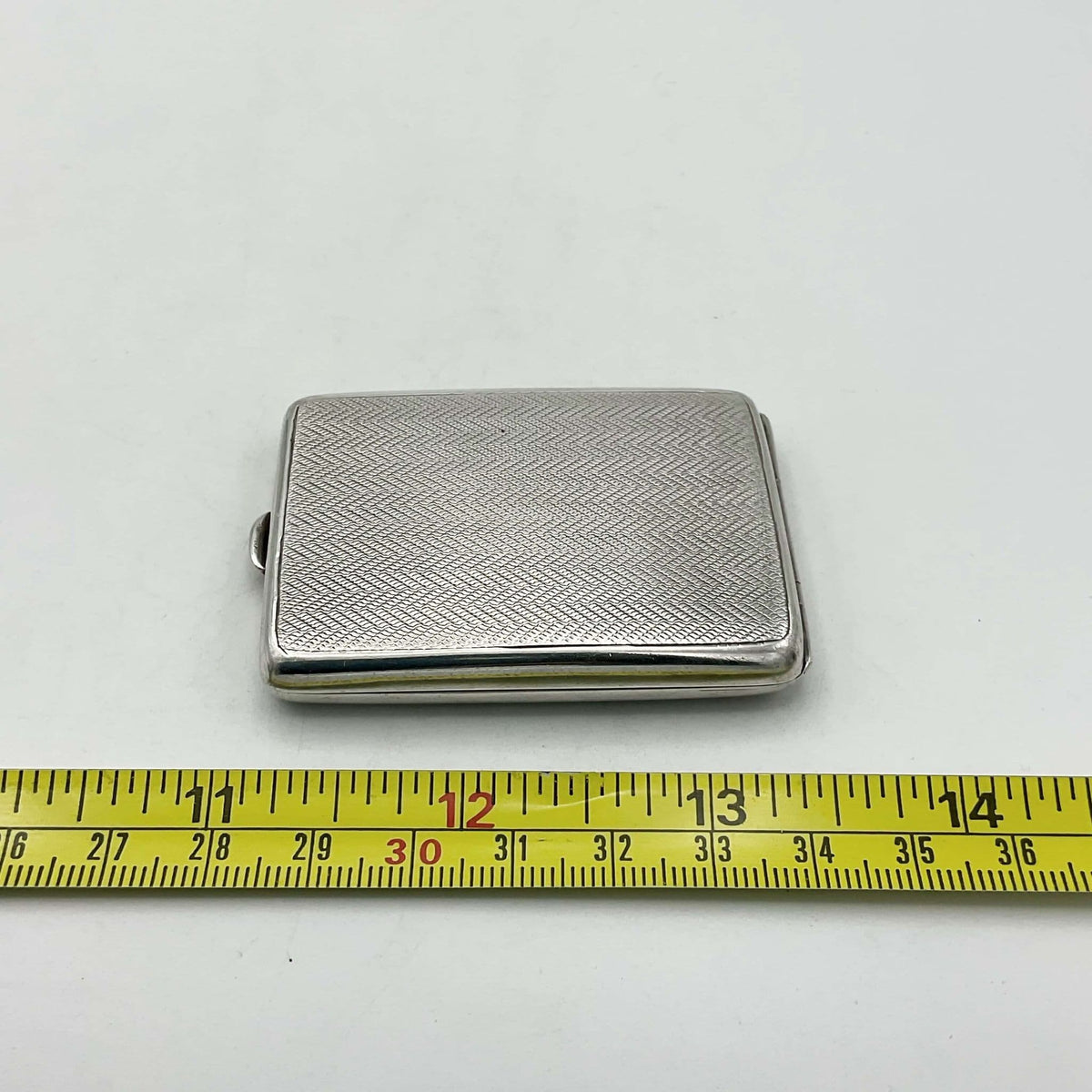 Antique 1921 silver matchbook holder with intricate engraved design, vintage Beeches Vintage matchcase for collecting or display.
