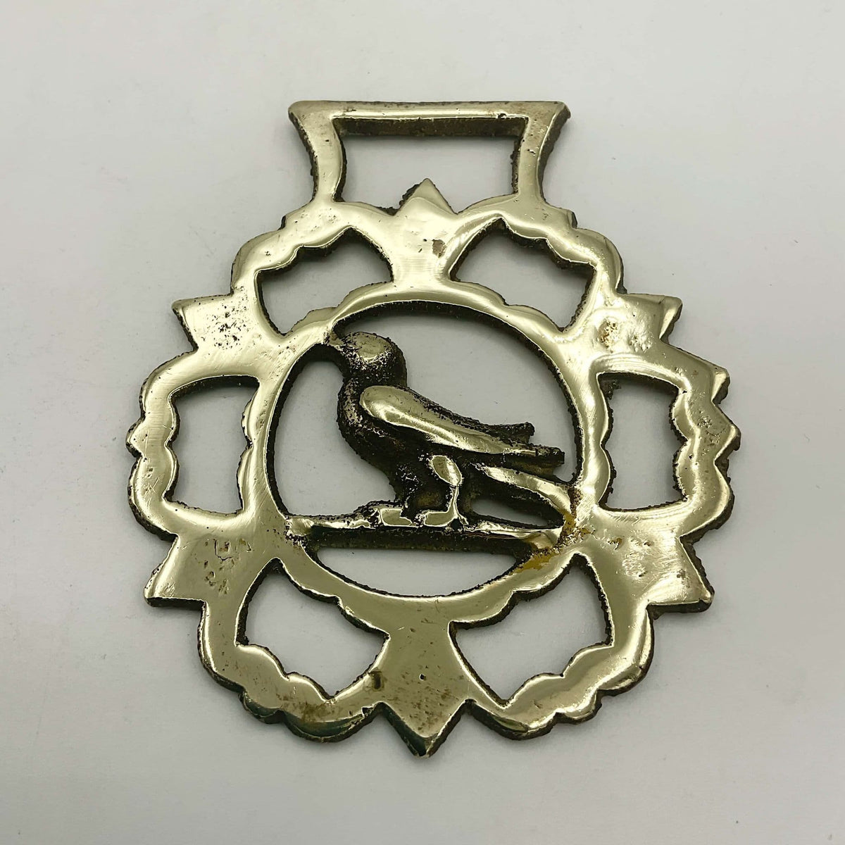 Antique Bird Horse Brass by Beeches Vintage featuring detailed brass horse and bird motifs, vintage decorative horse ornament.