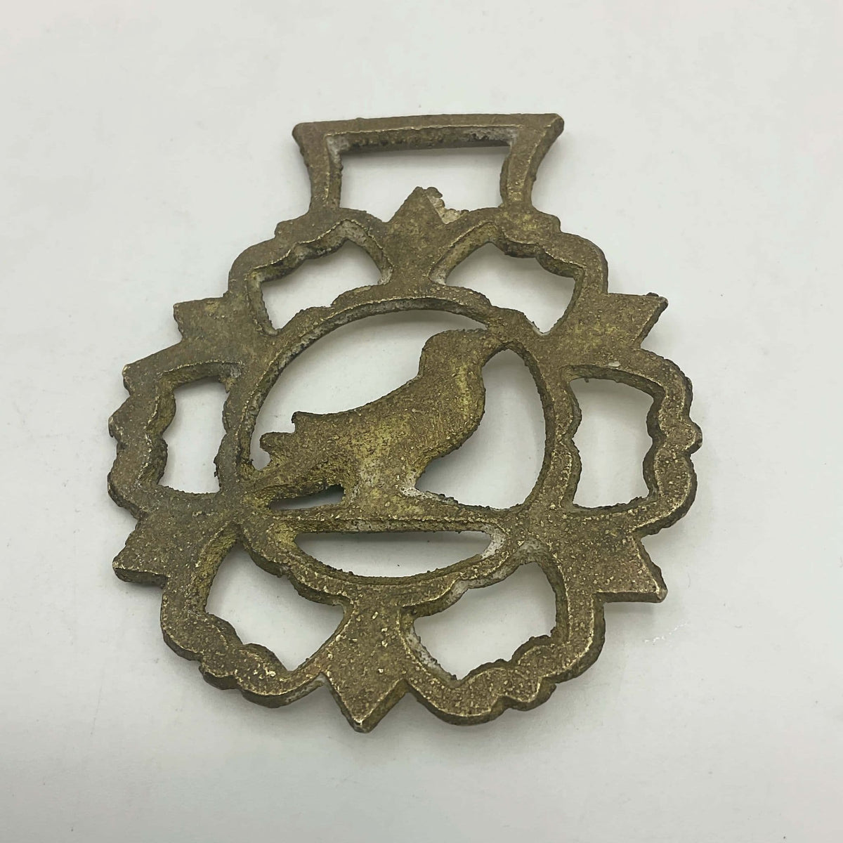 Antique Bird Horse Brass by Beeches Vintage, decorative brass horse ornament with intricate bird design.
